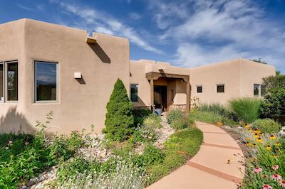 A Santa Fe home built by Chapman Homes in a traditional adobe style