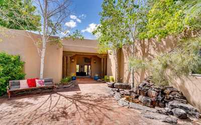 The front entry courtyard to a home in Santa Fe