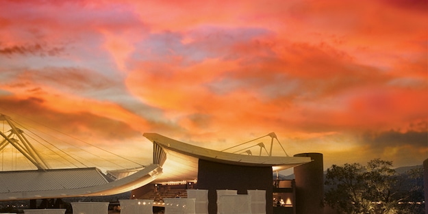 A dramatic sunset with the Santa Fe Opera building