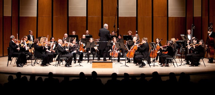 A symphonic performance on the stage of the Lensic Performing Arts Center in Santa Fe, New Mexico