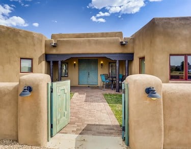 The courtyard entry to a Santa Fe home for sale