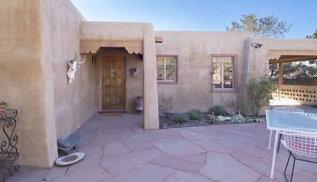 A 2-bedroom, 2-bathroom, 1,064 square foot home for sale located at 600 Camino Del Monte Sol, Santa Fe, New Mexico.