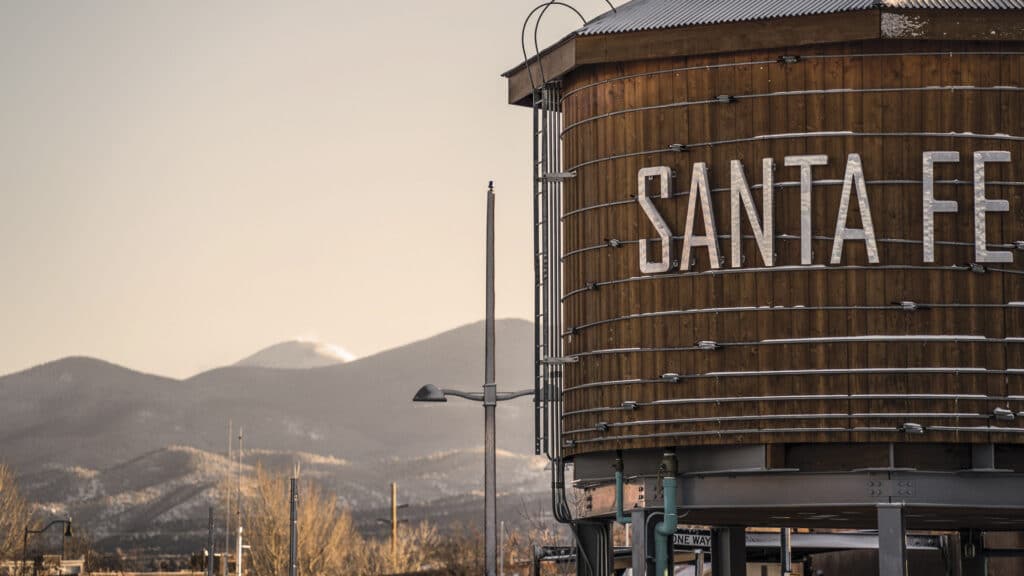 A view of the Santa Fe Railyard with the water town sign
