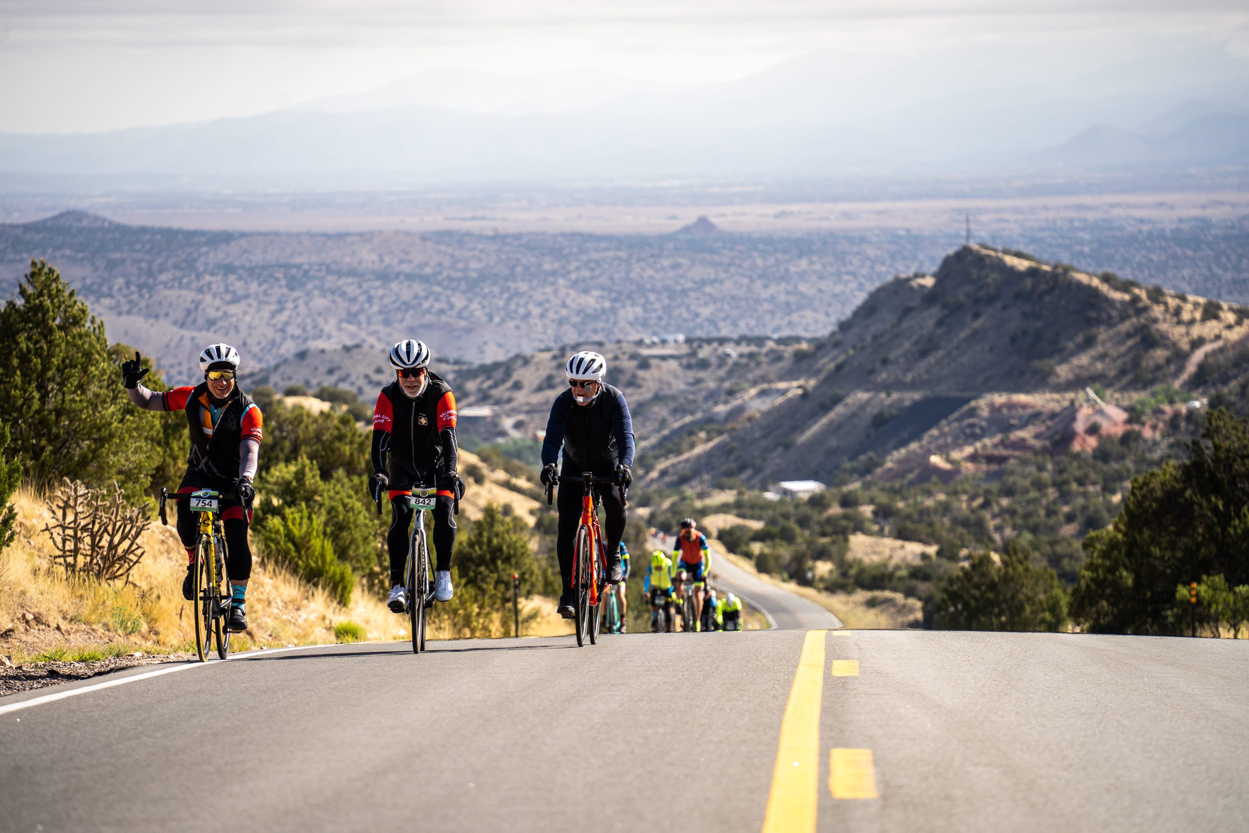 Santa Fe Century cyclists climbing a hill