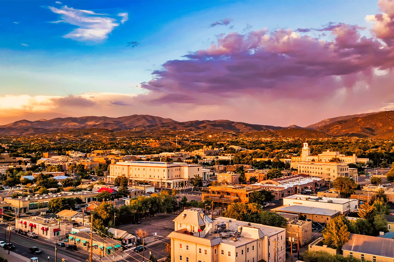 Aerial view of downtown Santa Fe and the Sangre de Cristo mountains