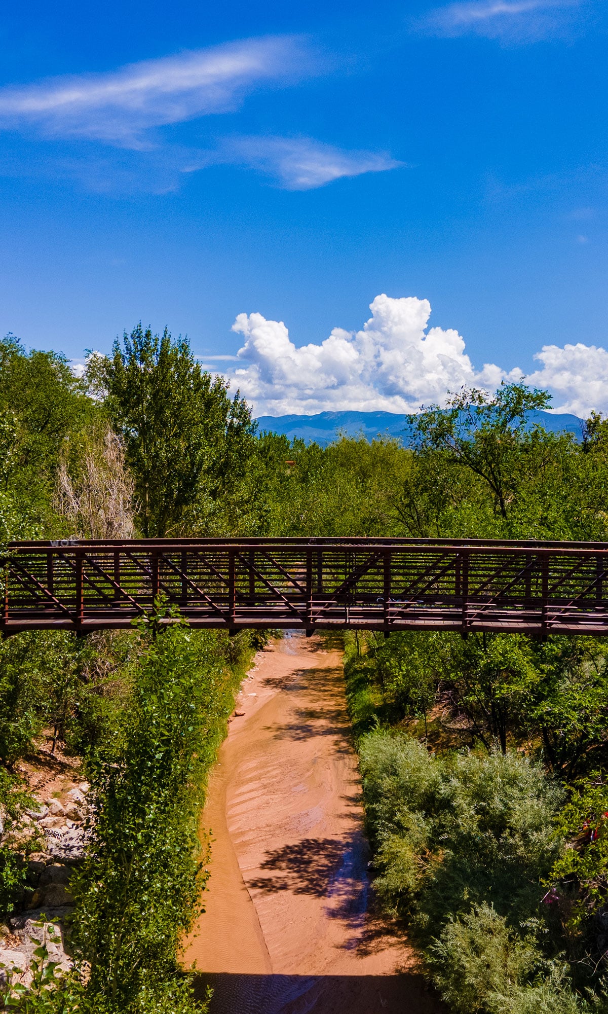 Footbridge over stream in Santa Fe, New Mexico.