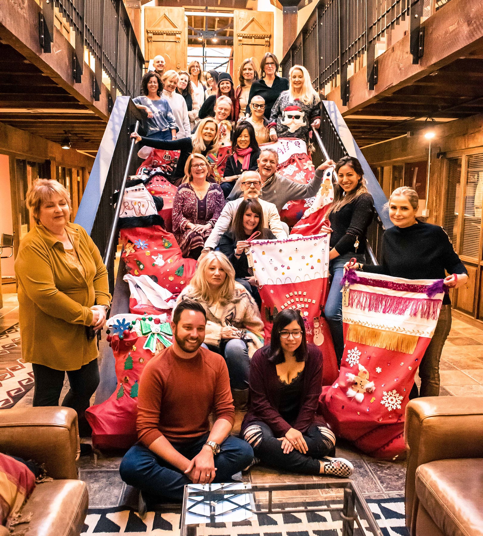 Barker Realty brokers and staff prepare gifts to donate for the holidays